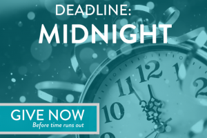 Clock with text reading, Deadline: Midnight, Give now before time runs out