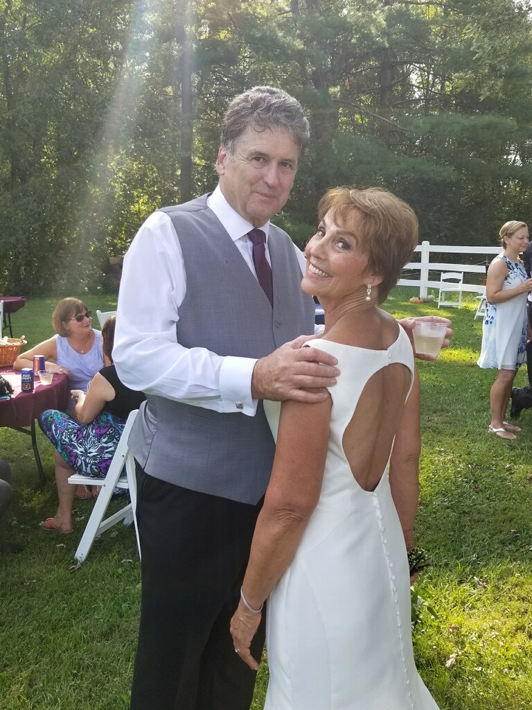 Penny Free with husband at wedding