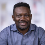 Richard Adeyemi headshot, smiling