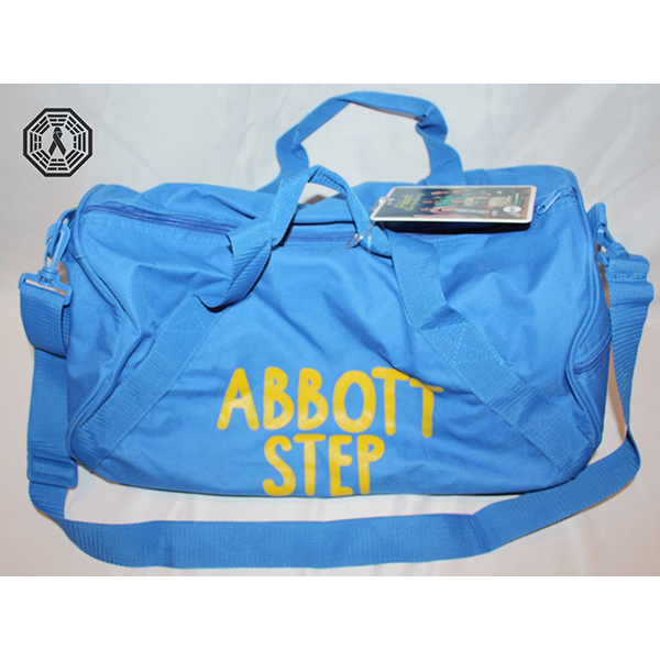 Blue duffel bag with yellow text reading ABBOTT STEP