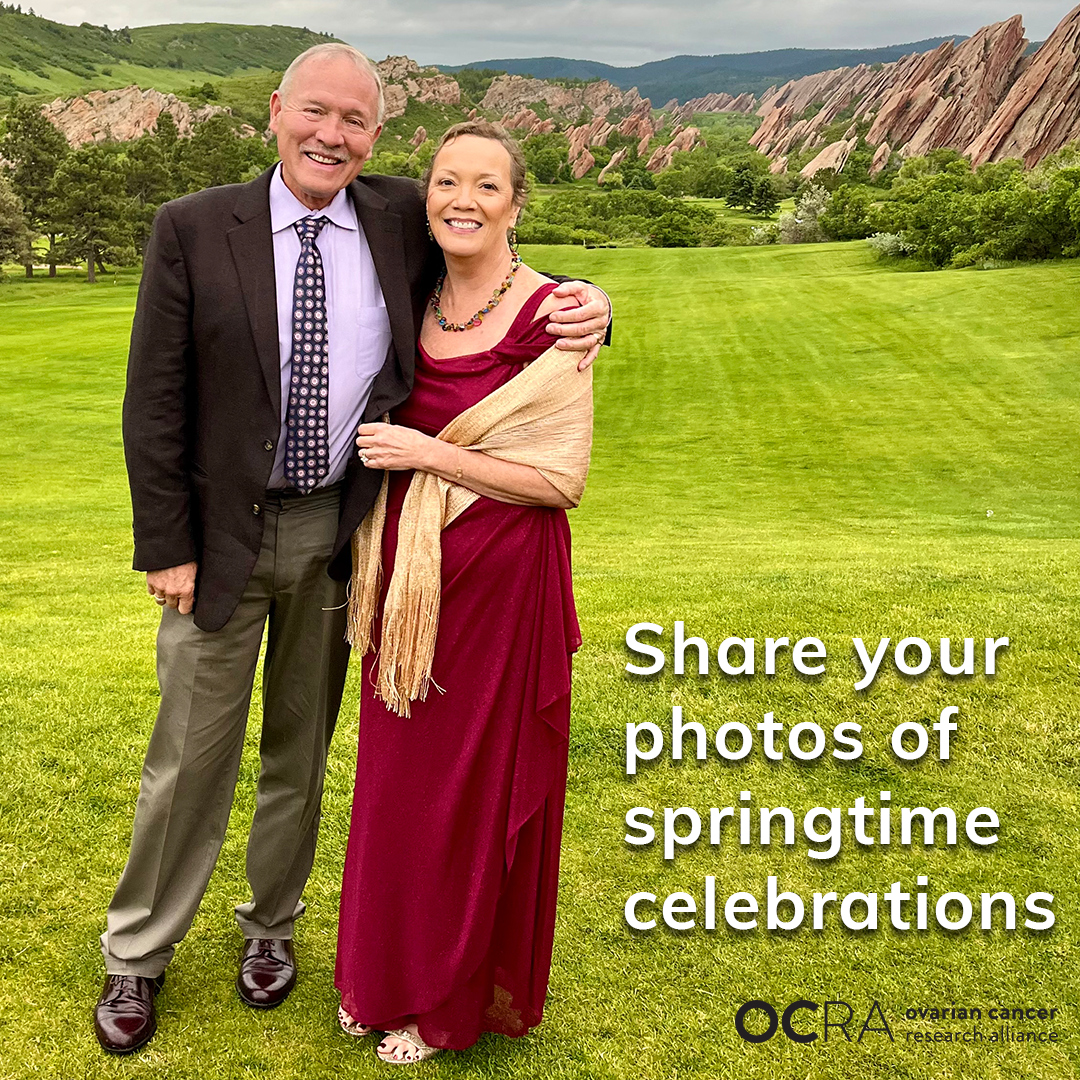 Photo with text overlay. Photo is in a beautiful outdoor setting, with green grass and mountains in the background. A couple, dressed formally, are smiling against this backdrop. The woman is wearing a red dress and shawl, and man is wearing a suit and tie. Text reads: Share your photos of springtime celebrations. Ovarian Cancer Research Alliance logo is at bottom right.