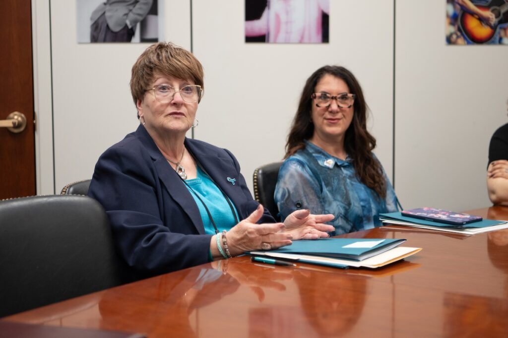 Two OCRA advocates visiting a legislative office