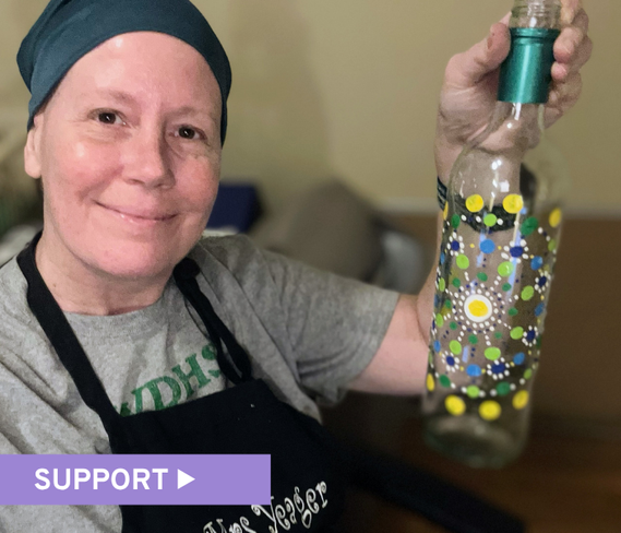 Woman holding bottle craft